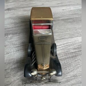 Vintage Model Car with Gold and Red Accents